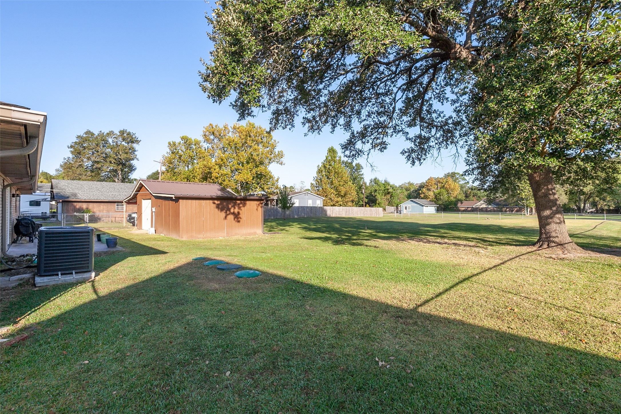 3381 Carpenter Road Orange, TX 77630 - Photo 25 of 29 a view of a backyard with swimming pool