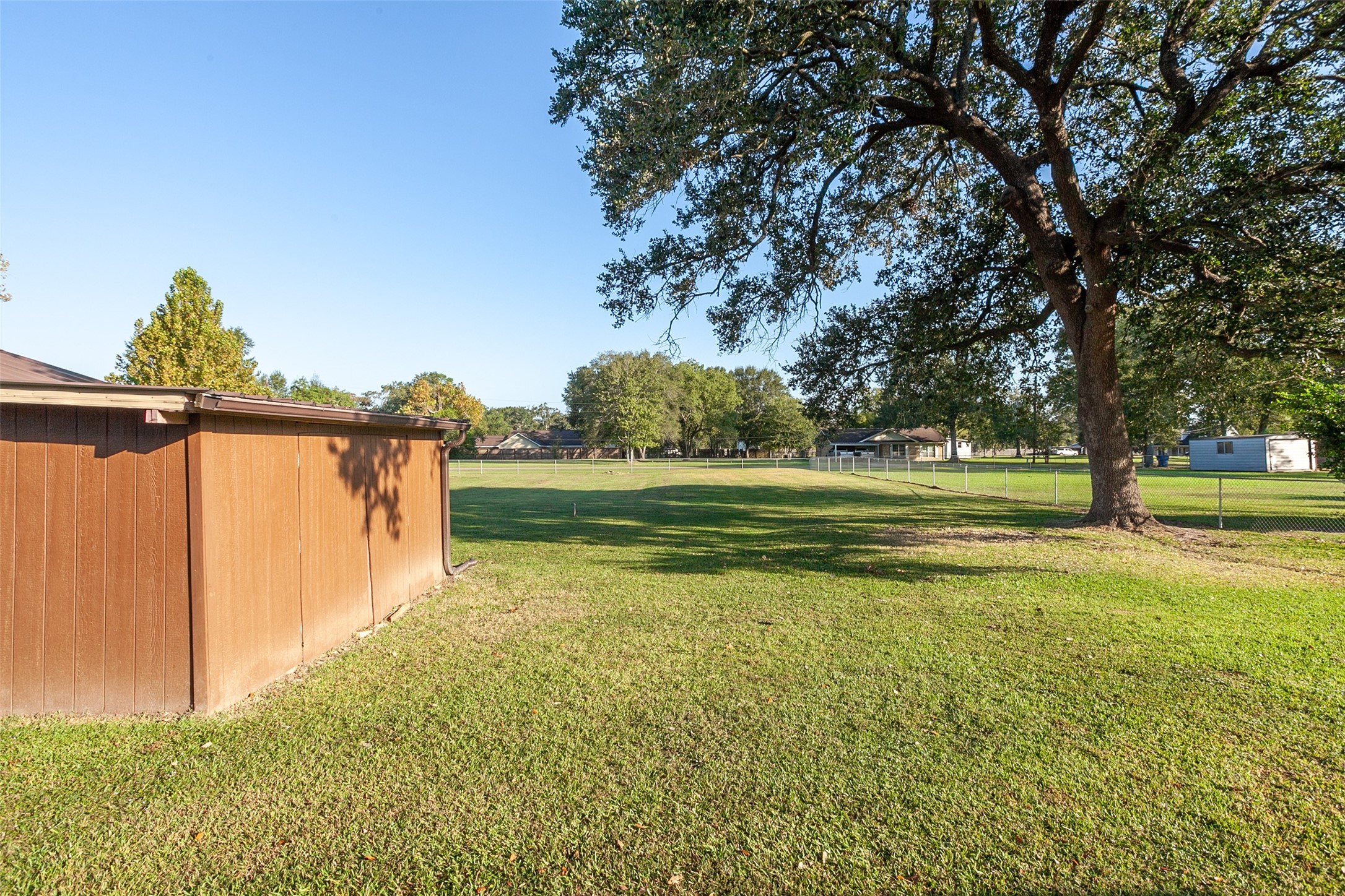 3381 Carpenter Road Orange, TX 77630 - Photo 26 of 29 a view of a golf course with a lake view