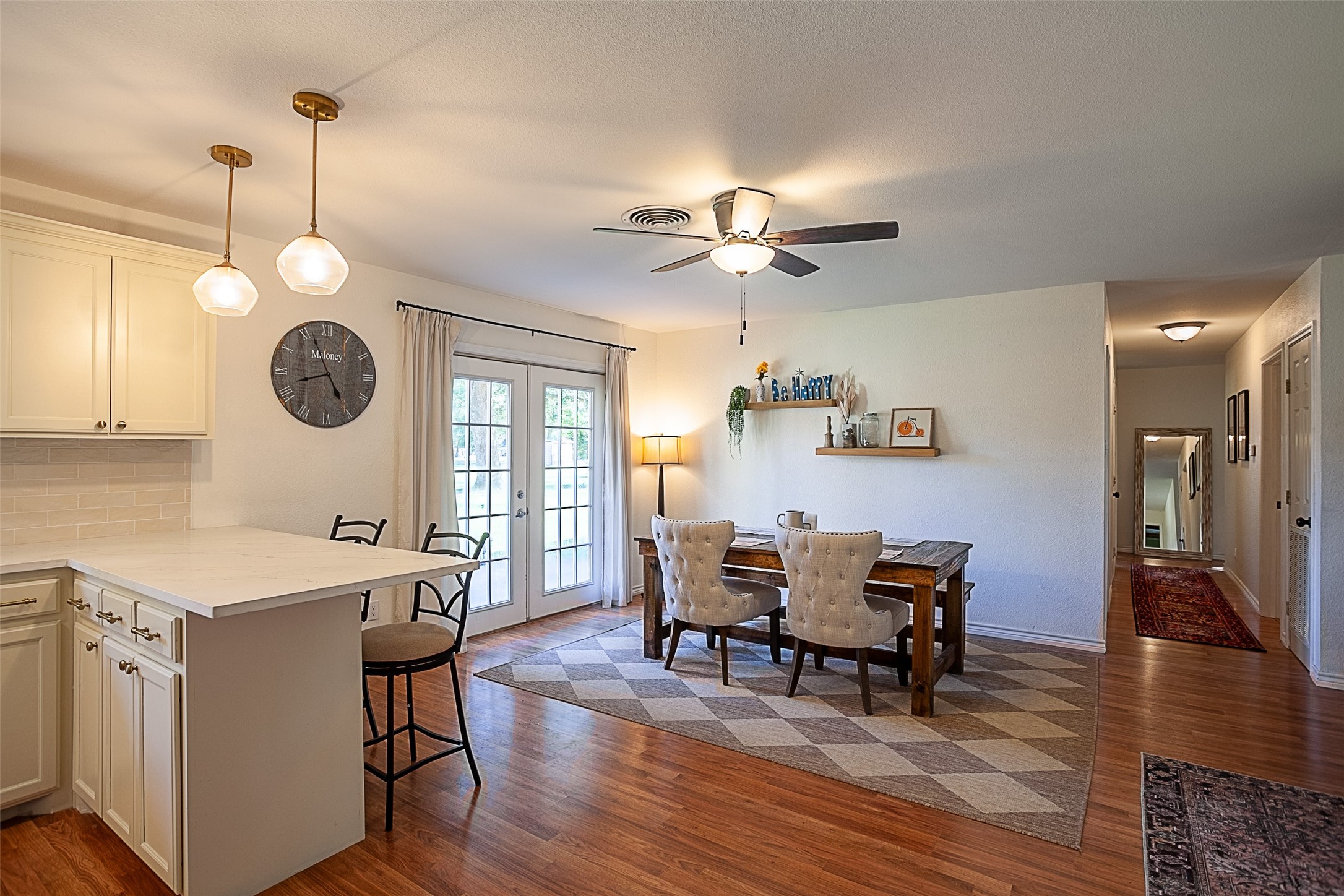 3381 Carpenter Road Orange, TX 77630 - Photo 7 of 29 a view of a dining room with furniture wooden floor and chandelier