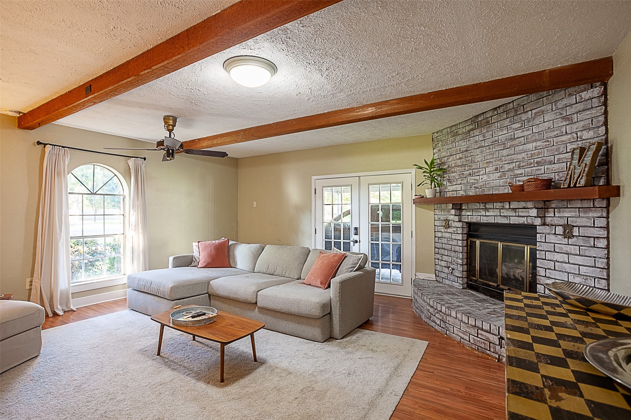 3381 Carpenter Road Orange, TX 77630 - Photo 10 of 29 a living room with furniture and a fireplace