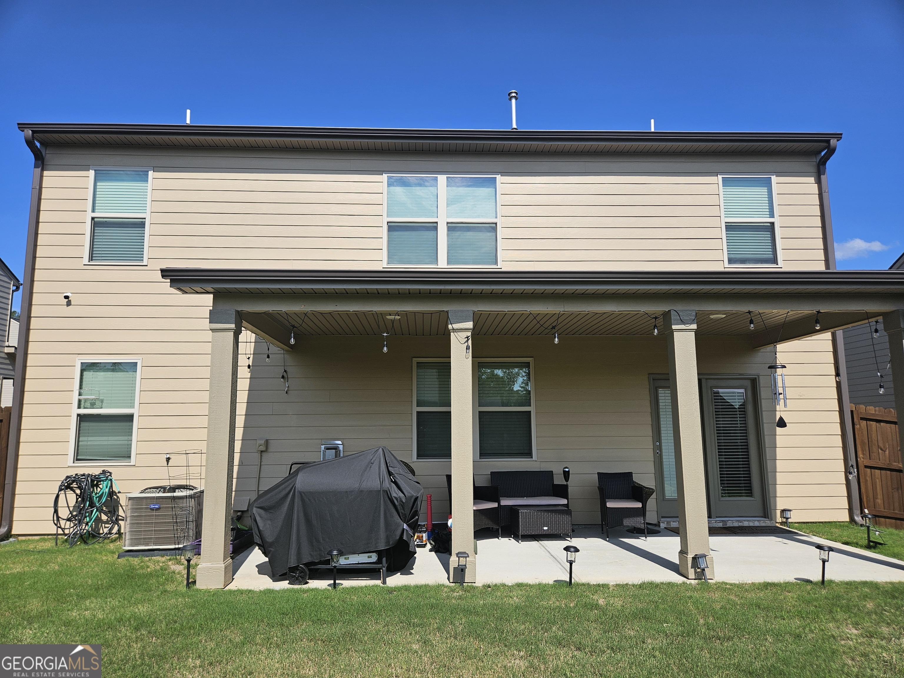 5454 Flat Rock Point Lithonia, GA 30038 - Photo 21 of 24 a view of backyard with a garden and plants