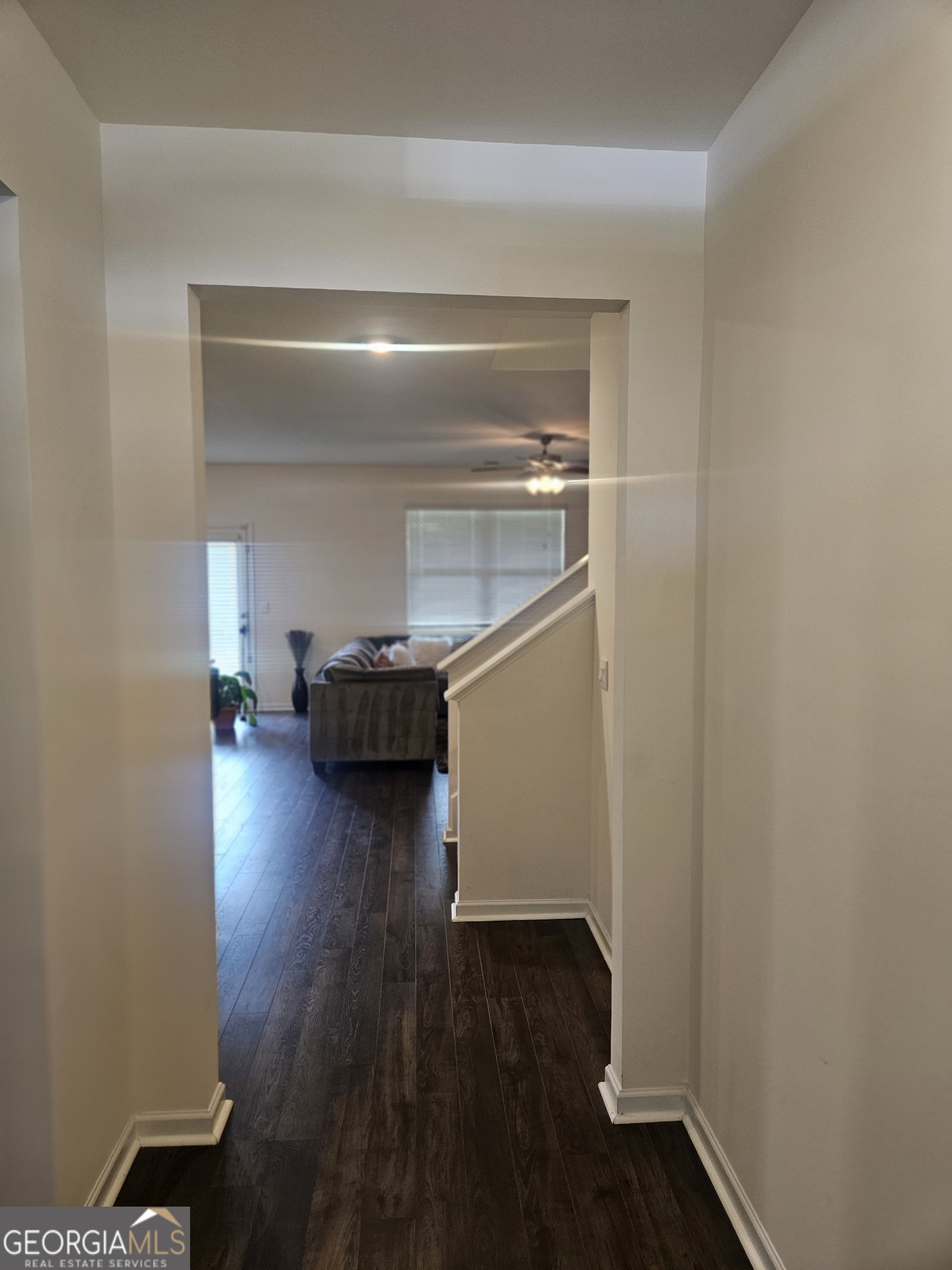 5454 Flat Rock Point Lithonia, GA 30038 - Photo 5 of 24 a view of a livingroom with wooden floor and a cabinet
