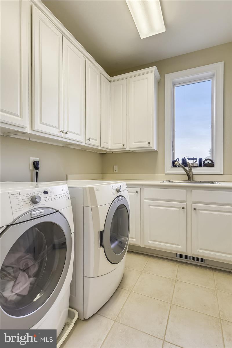 207 Riverview Road Stevensville, MD 21666 - Photo 28 of 49 This Laundry Room Has Plenty of Storage
