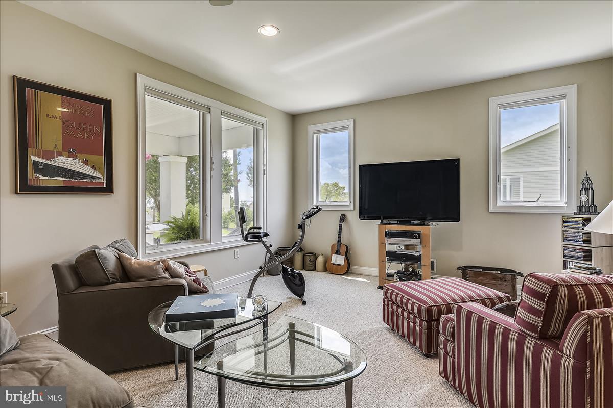 207 Riverview Road Stevensville, MD 21666 - Photo 30 of 49 Lower Level Family Room w/ Tons of Natural Light