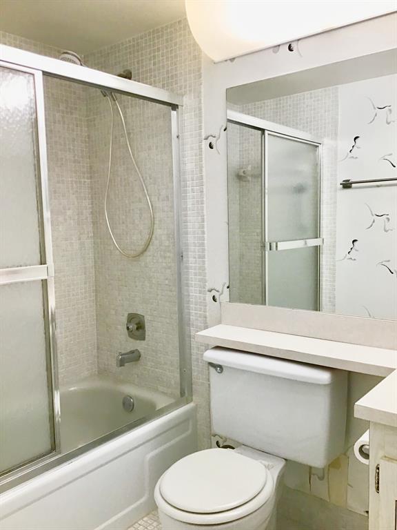204 Preston Way, Unit 204 Boca Raton, FL 33434 - Photo 20 of 31 a bathroom with a toilet and a shower