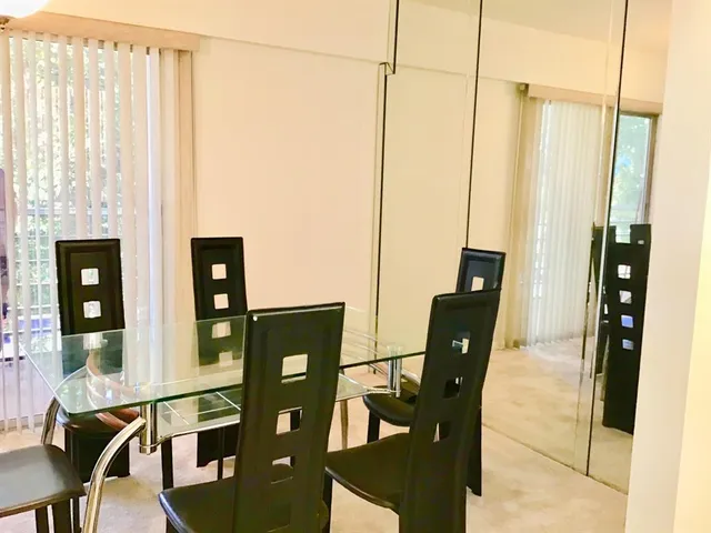 a view of a living room with furniture