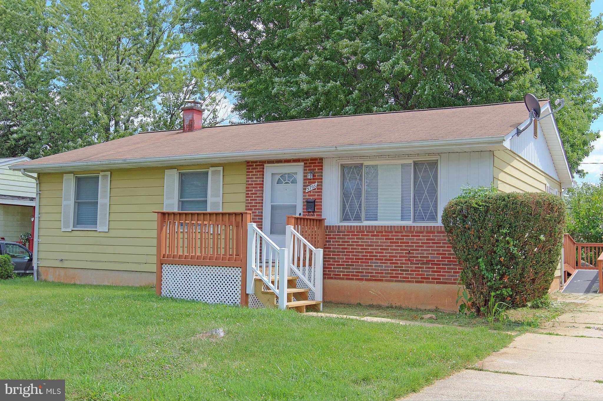 3705 Collier Road Randallstown, MD 21133 - Photo 1 of 30 a view of a house with a yard and sitting area