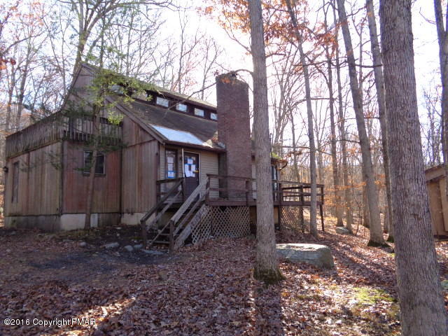 6207 Decker Road Bushkill, PA 18324 - Photo 1 of 6 a backyard of a house with lots of green space