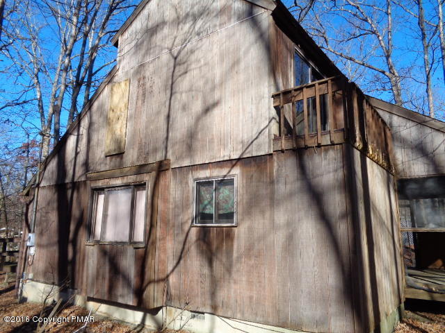 6207 Decker Road Bushkill, PA 18324 - Photo 3 of 6 a view of balcony with wooden floor and fence