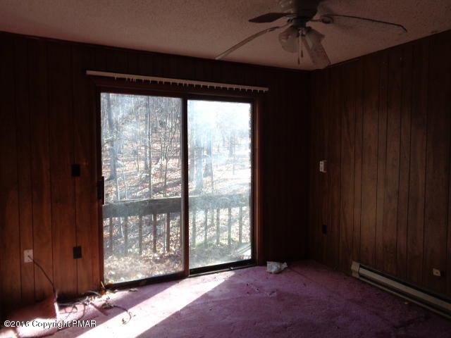 6207 Decker Road Bushkill, PA 18324 - Photo 6 of 6 a view of an empty room with a window