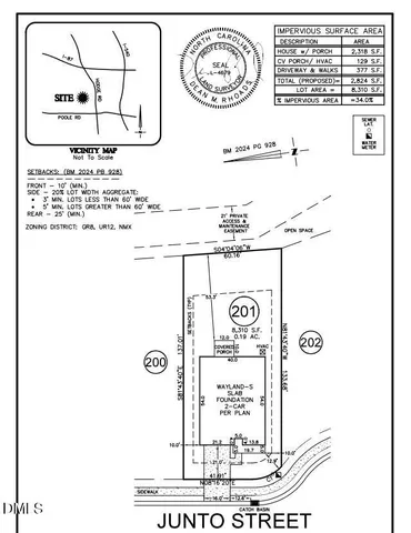 a living room with furniture and a view of kitchen