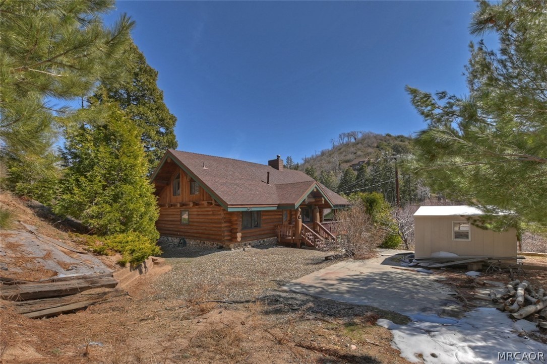 29632 Hook Creek Road Cedar Glen, CA 92321 - Photo 37 of 43 a view of a house with a yard