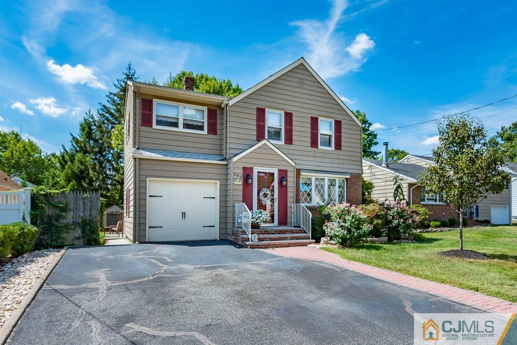 193 New Dover Road Colonia, NJ 07067 - Photo 2 of 25 a front view of a house with a yard