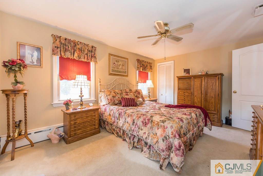 193 New Dover Road Colonia, NJ 07067 - Photo 16 of 25 a bedroom with bed and a window