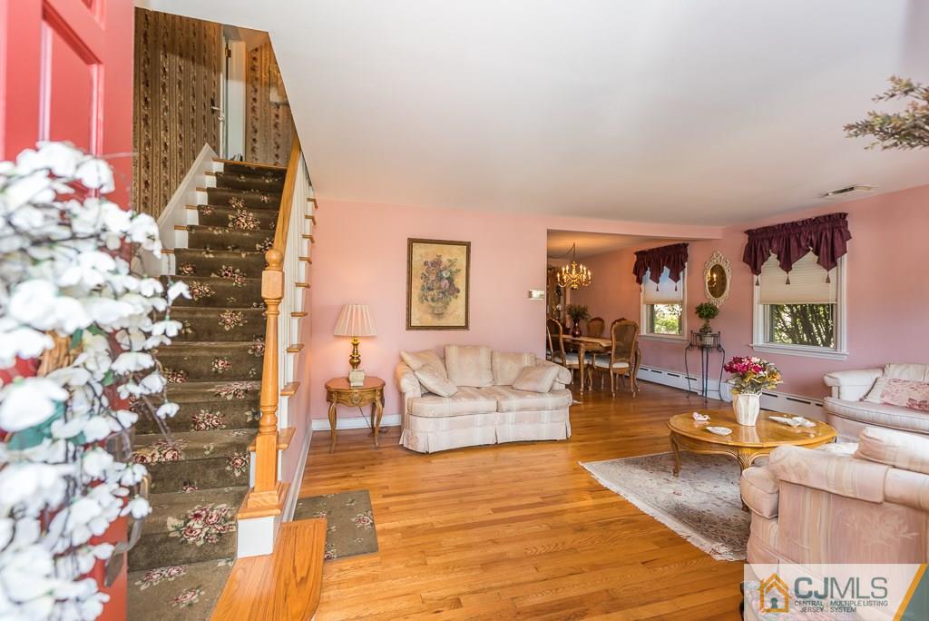 193 New Dover Road Colonia, NJ 07067 - Photo 3 of 25 a living room with furniture and wooden floor