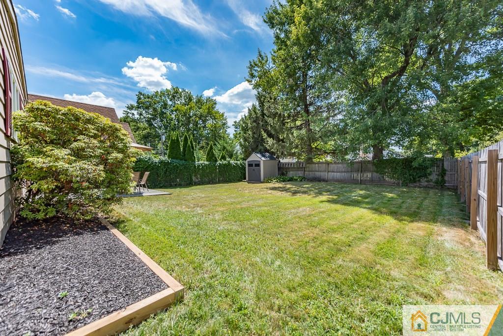 193 New Dover Road Colonia, NJ 07067 - Photo 25 of 25 a backyard of a house with lots of green space