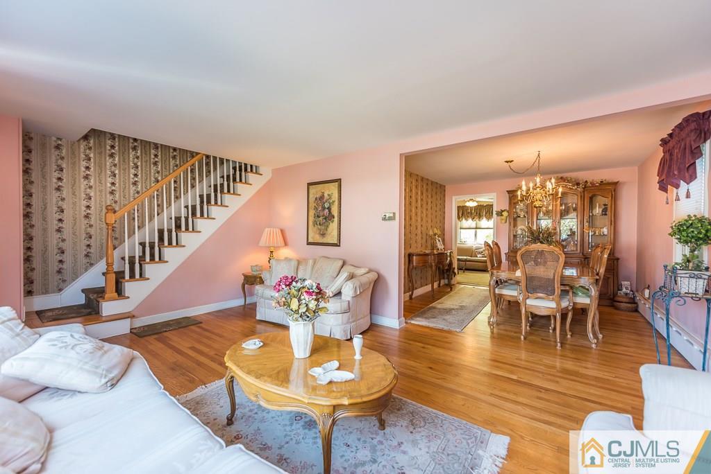 193 New Dover Road Colonia, NJ 07067 - Photo 6 of 25 a living room with furniture and wooden floor