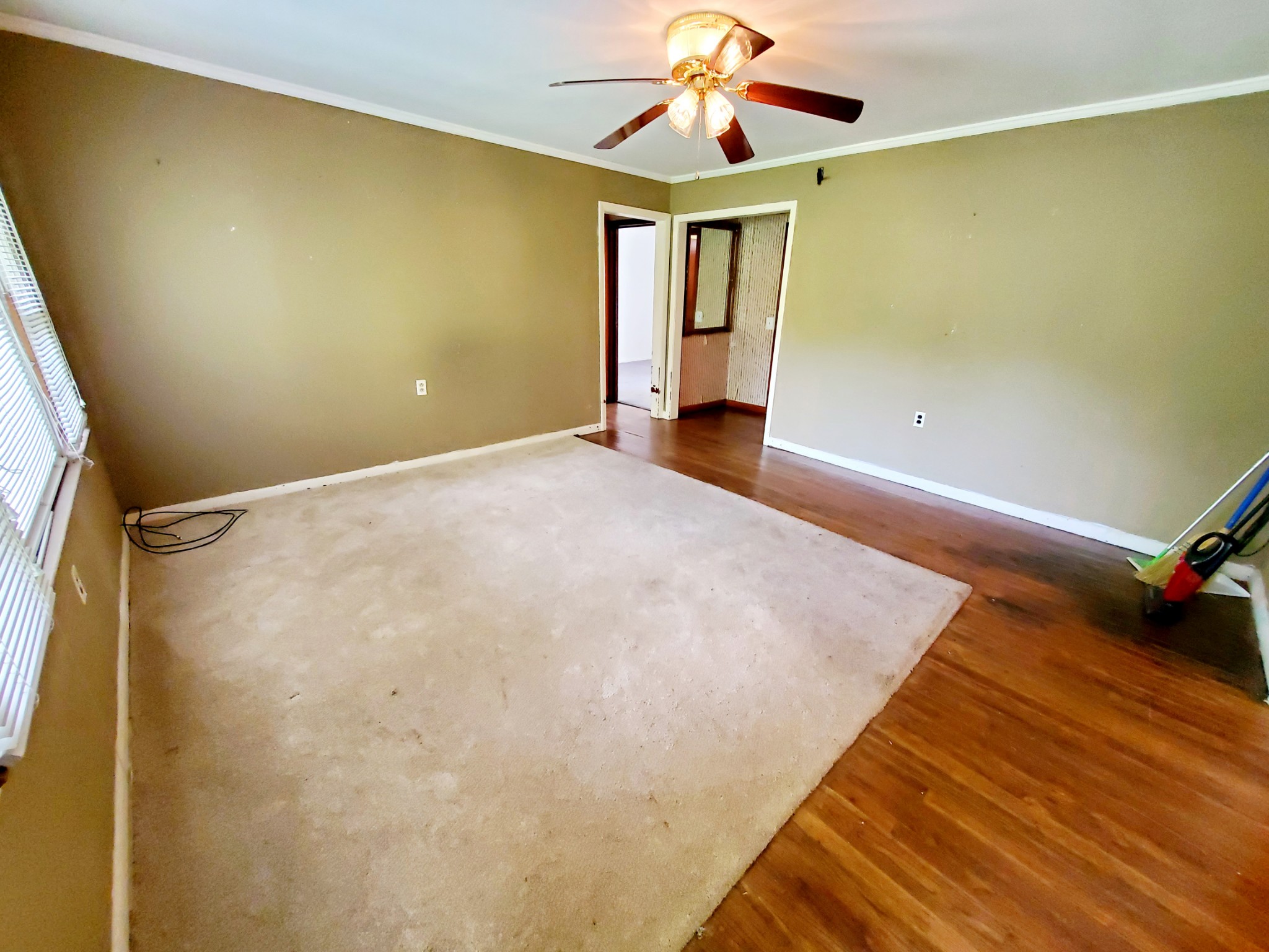 8340 Austin Bottom Road Baxter, TN 38544 - Photo 11 of 32 a view of empty room with a ceiling fan and a window