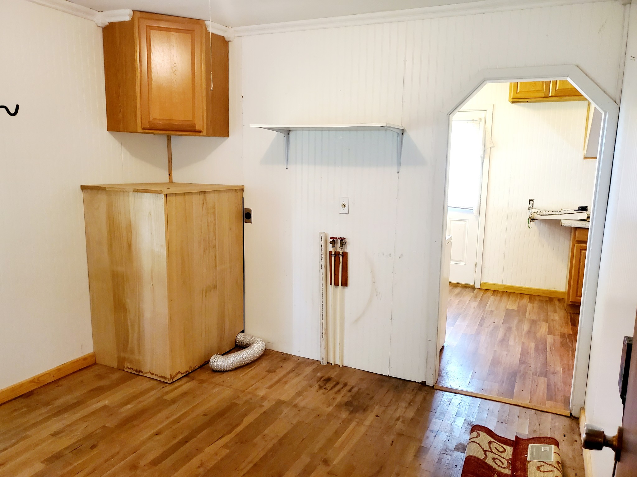8340 Austin Bottom Road Baxter, TN 38544 - Photo 24 of 32 a view of a room with wooden floor cabinet and mirror