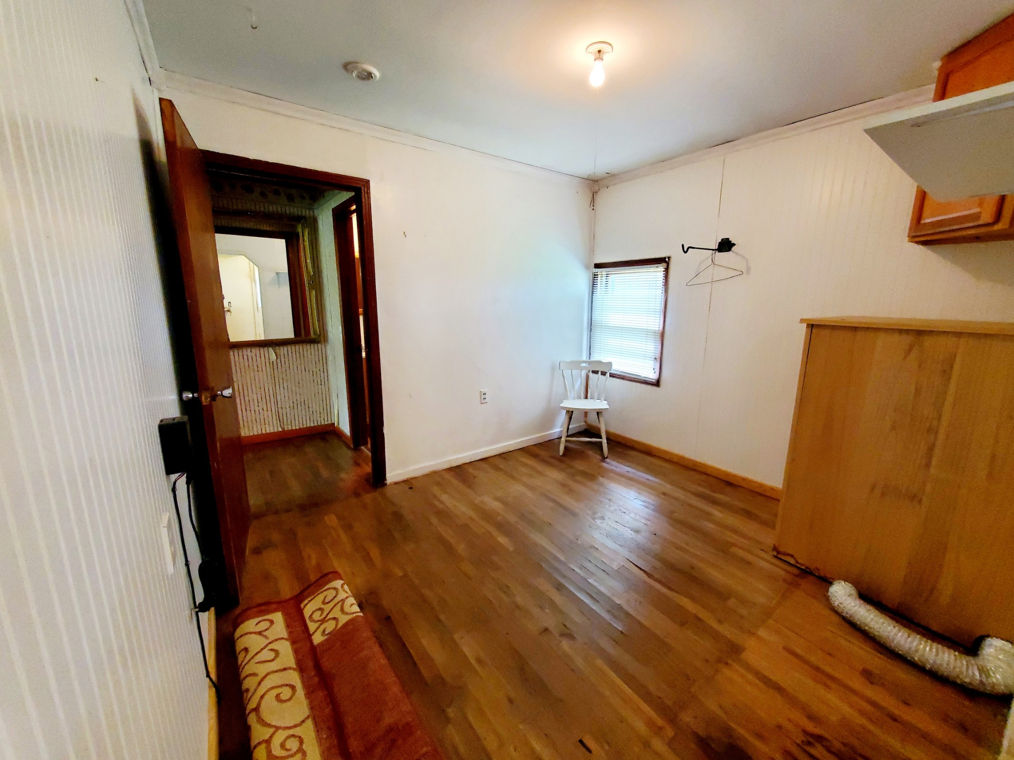 8340 Austin Bottom Road Baxter, TN 38544 - Photo 27 of 32 wooden floor in an empty room