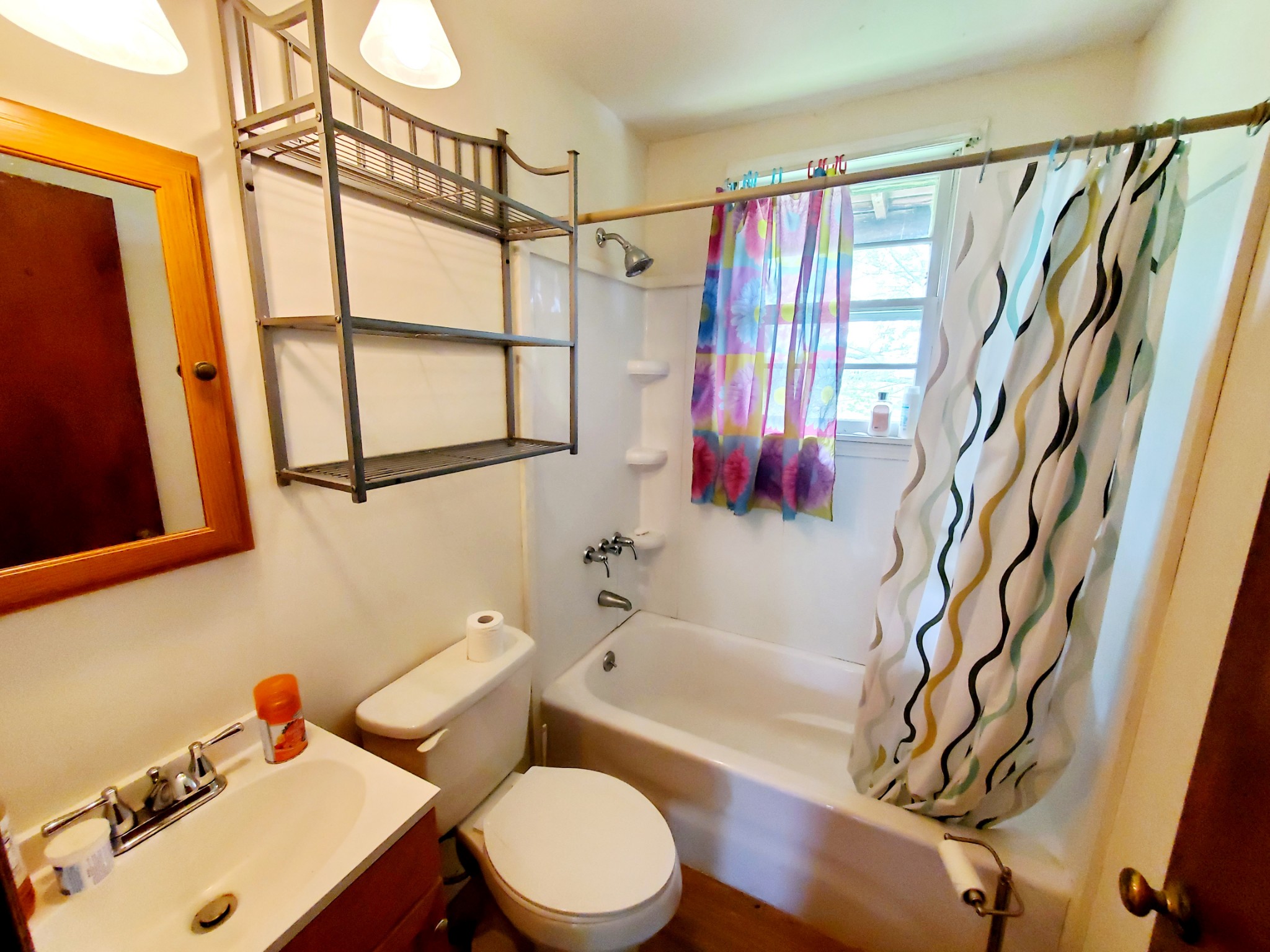8340 Austin Bottom Road Baxter, TN 38544 - Photo 28 of 32 a bathroom with a sink toilet and shower