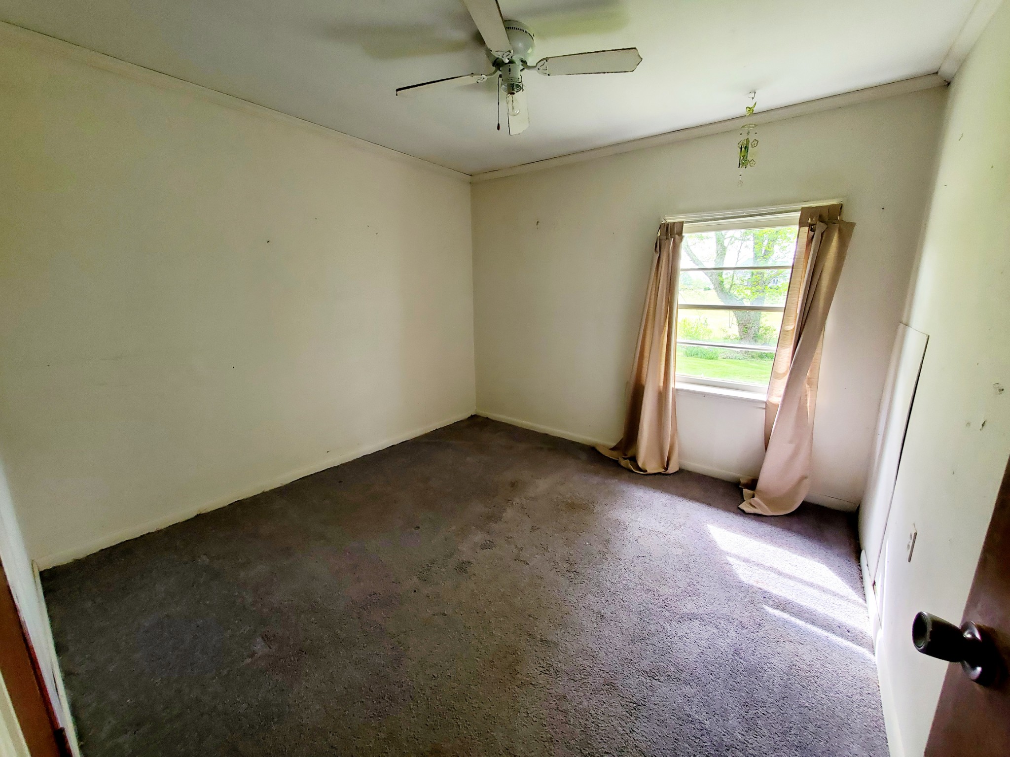 8340 Austin Bottom Road Baxter, TN 38544 - Photo 30 of 32 an empty room with windows