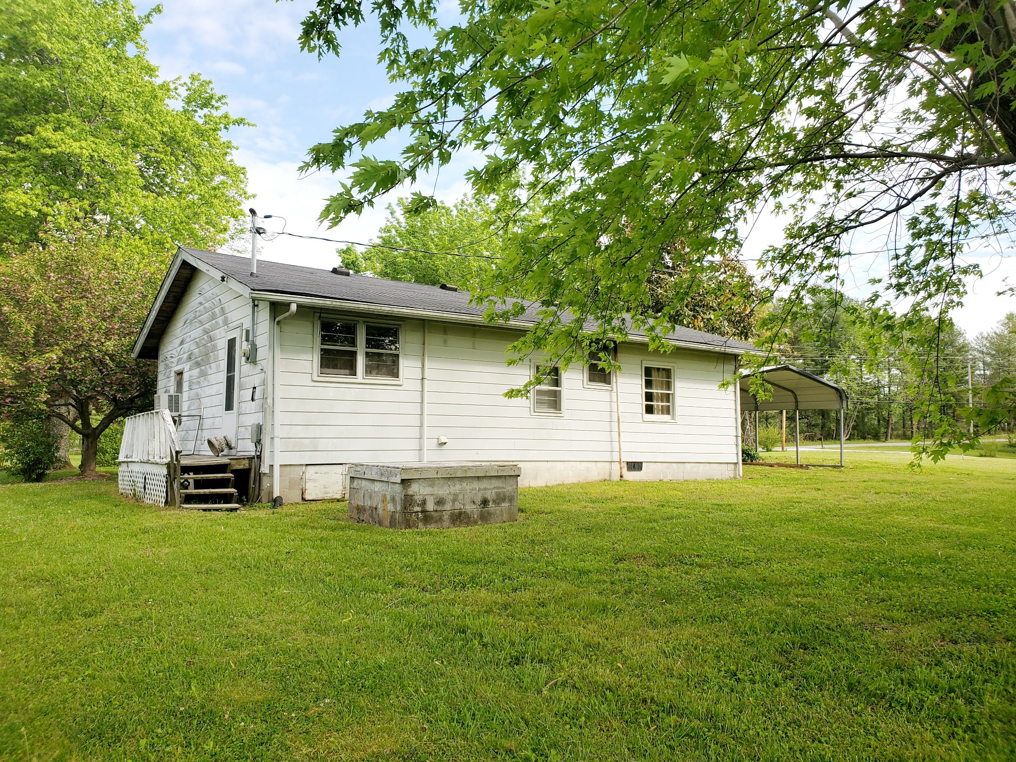 8340 Austin Bottom Road Baxter, TN 38544 - Photo 7 of 32 a front view of house with yard and trees