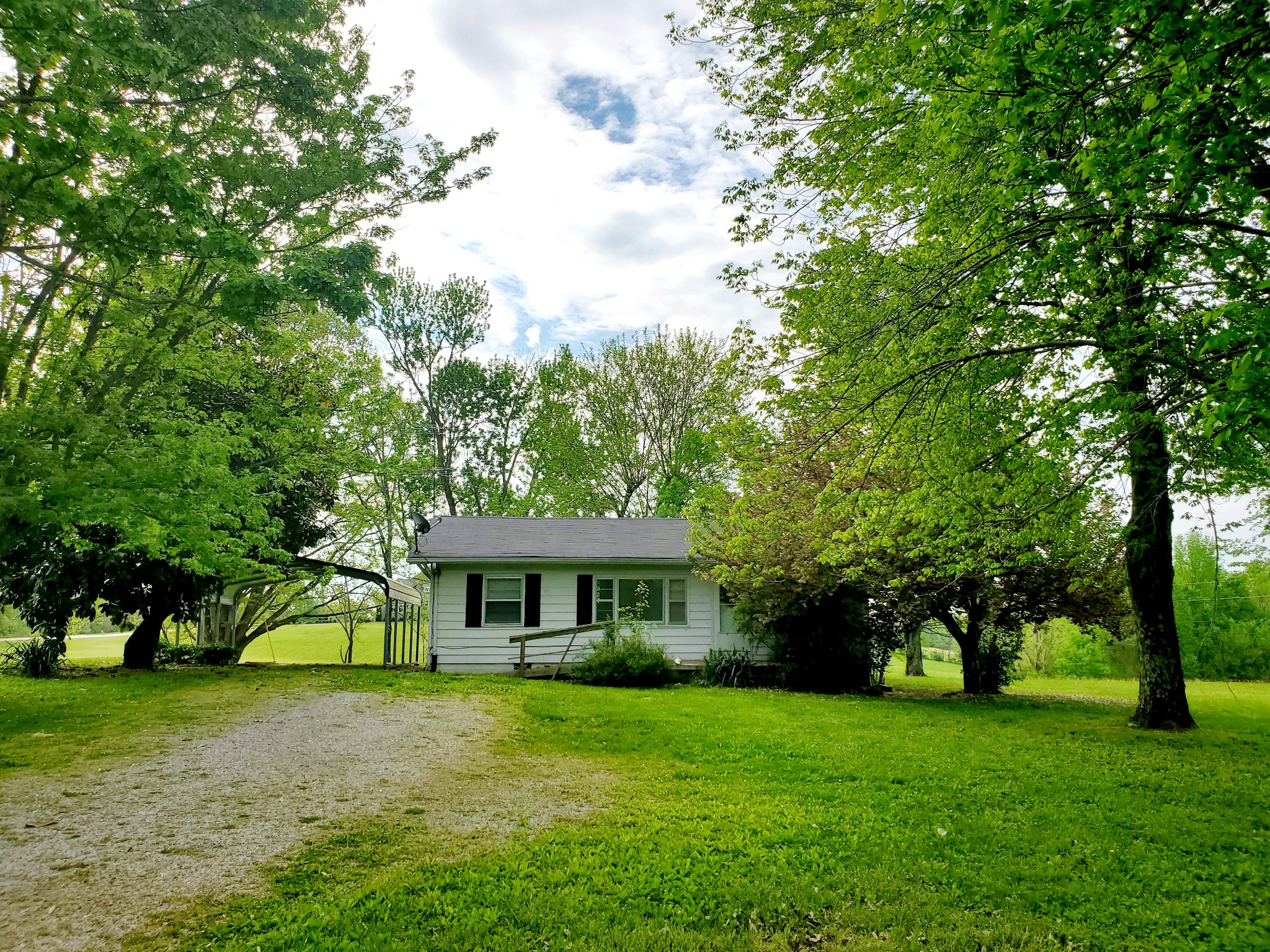 8340 Austin Bottom Road Baxter, TN 38544 - Photo 8 of 32 a view of a house with a yard