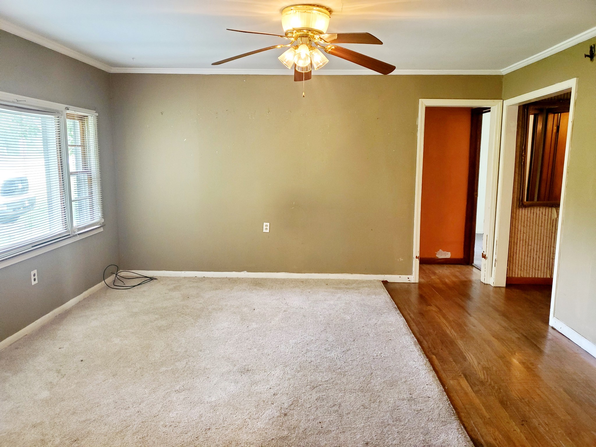 8340 Austin Bottom Road Baxter, TN 38544 - Photo 10 of 32 a view of an empty room with window and wooden floor