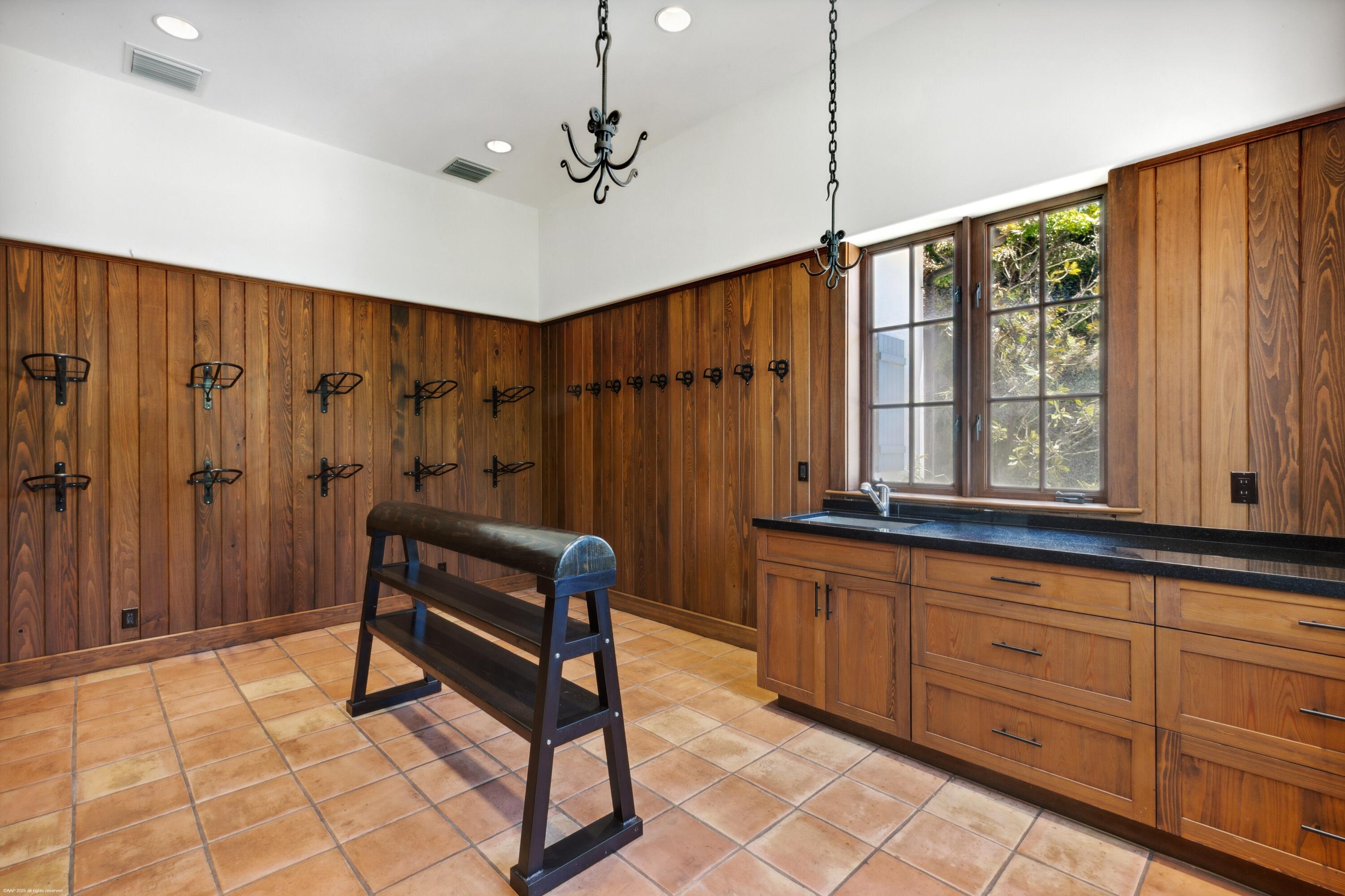 14775 Equestrian Way, Unit STALLS Wellington, FL 33414 - Photo 12 of 19 a bedroom with furniture and a window