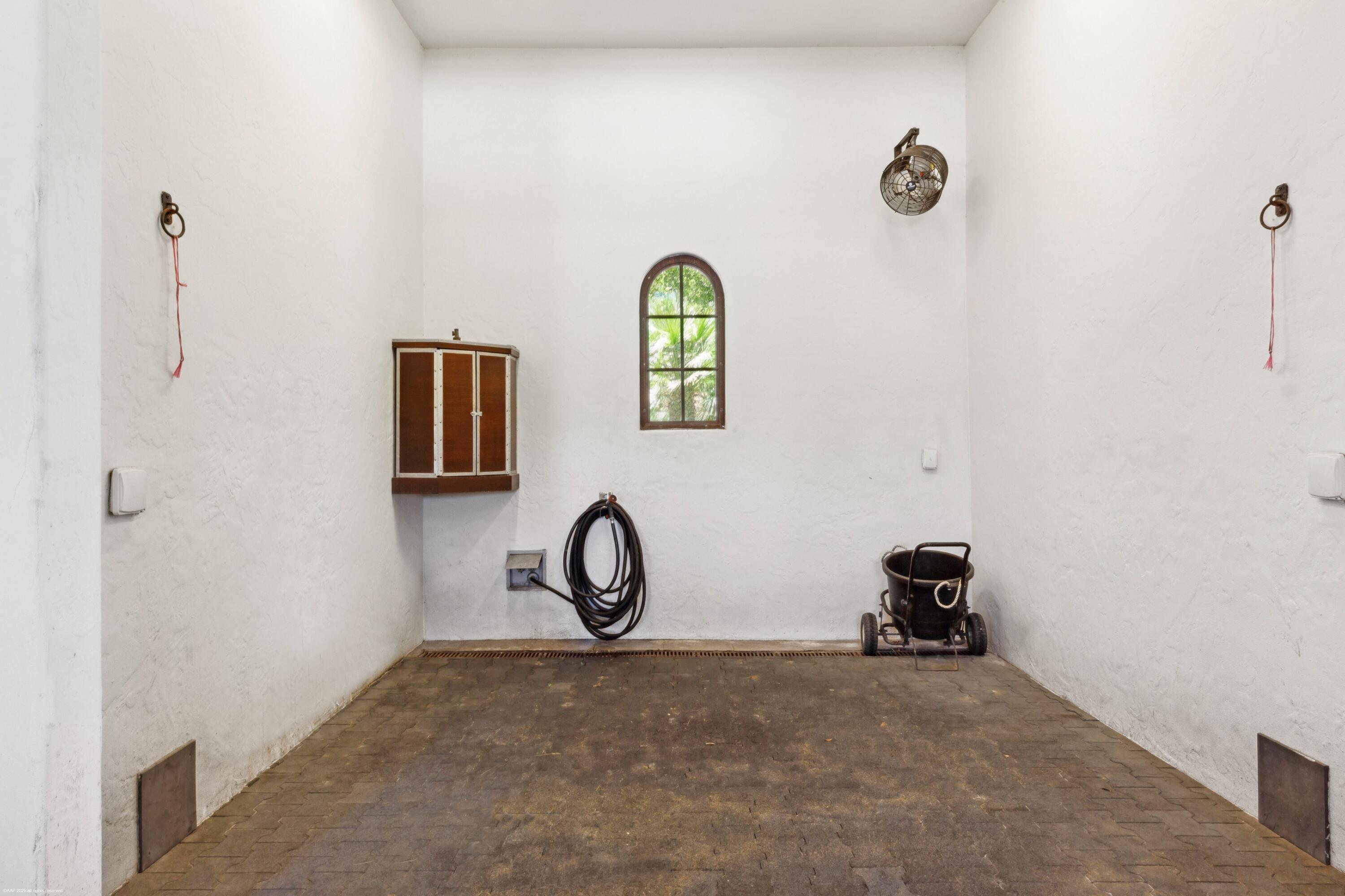 14775 Equestrian Way, Unit STALLS Wellington, FL 33414 - Photo 13 of 19 a view of a livingroom with toys