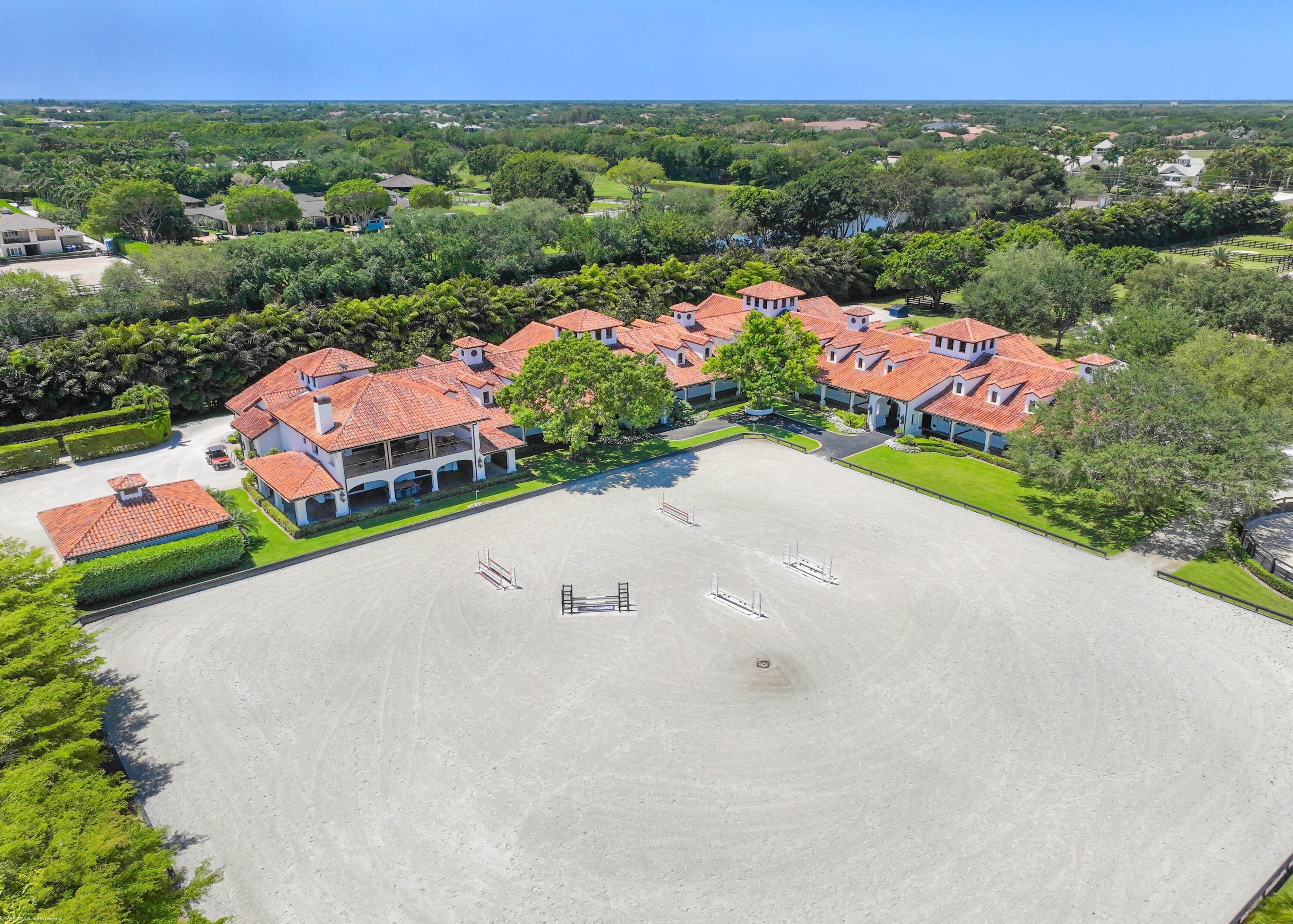 14775 Equestrian Way, Unit STALLS Wellington, FL 33414 - Photo 10 of 19 an aerial view of a houses with street view