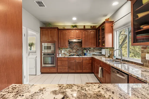 $900,000 | 7716 Waldon Drive, Unit E, Austin, TX 78750