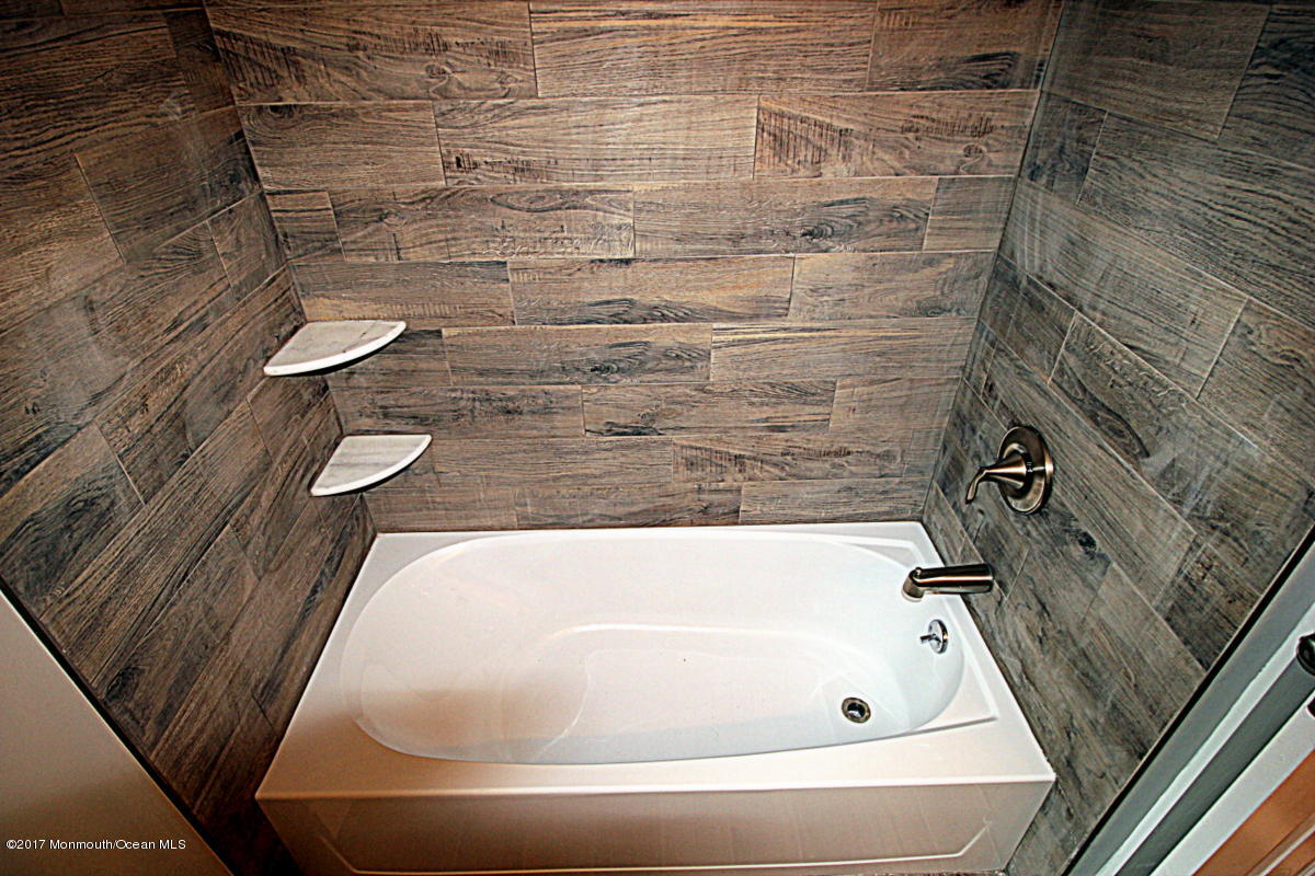 16 Salem Hill Road Howell, NJ 07731 - Photo 8 of 19 Custom ceramic tiled tub surround