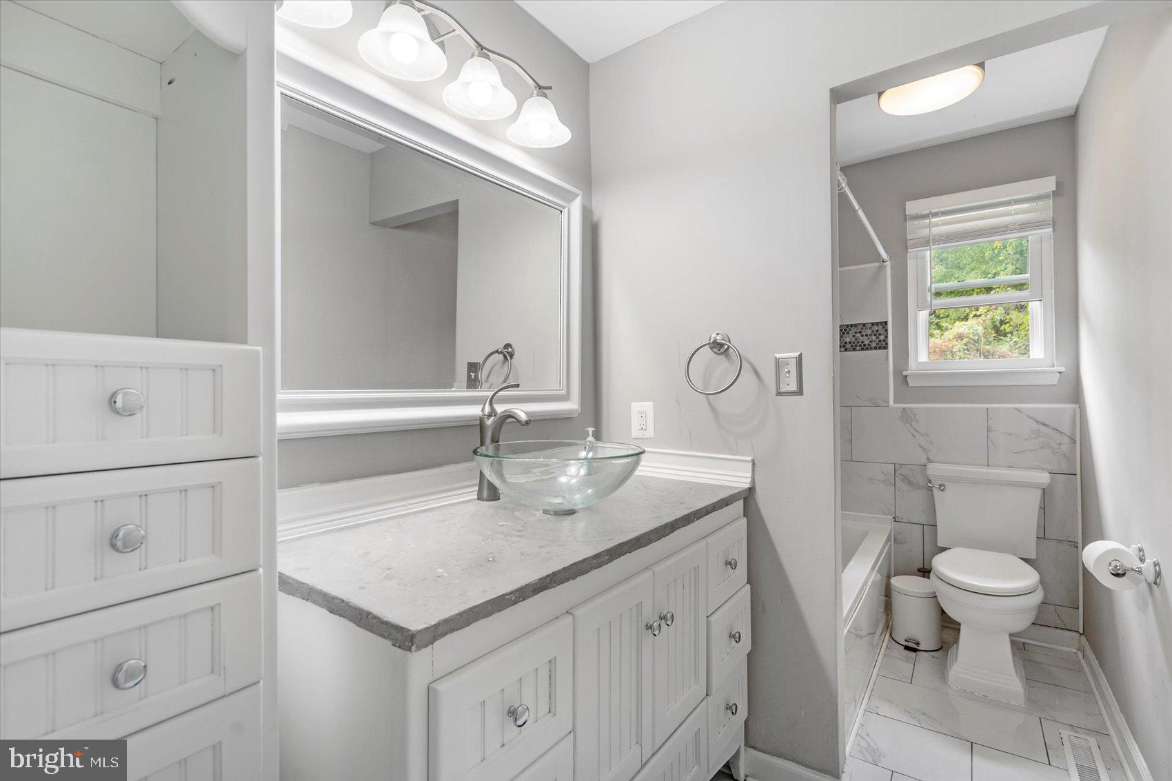 4203 Hollow Spring Lane Baltimore, MD 21236 - Photo 28 of 45 Hall Bathroom