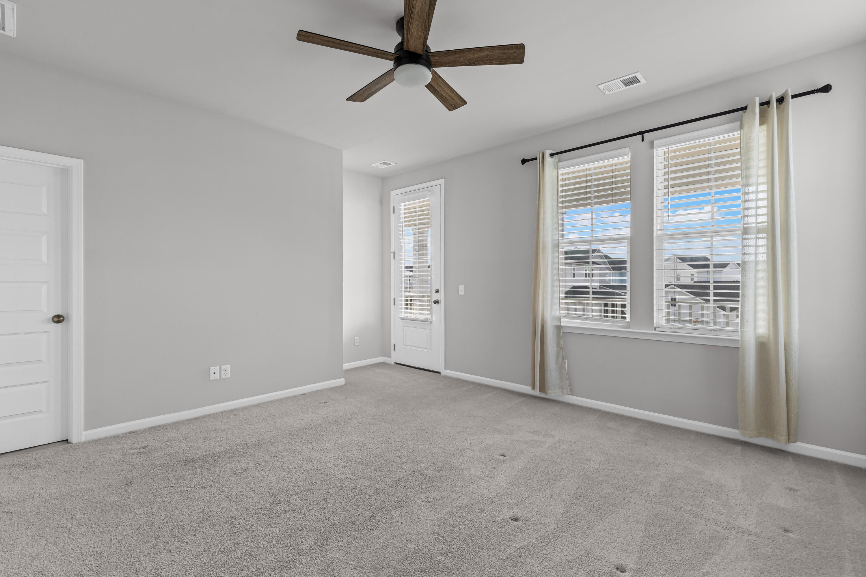 385 Woodgate Way Summerville, SC 29485 - Photo 23 of 45 Primary Suite to private balcony