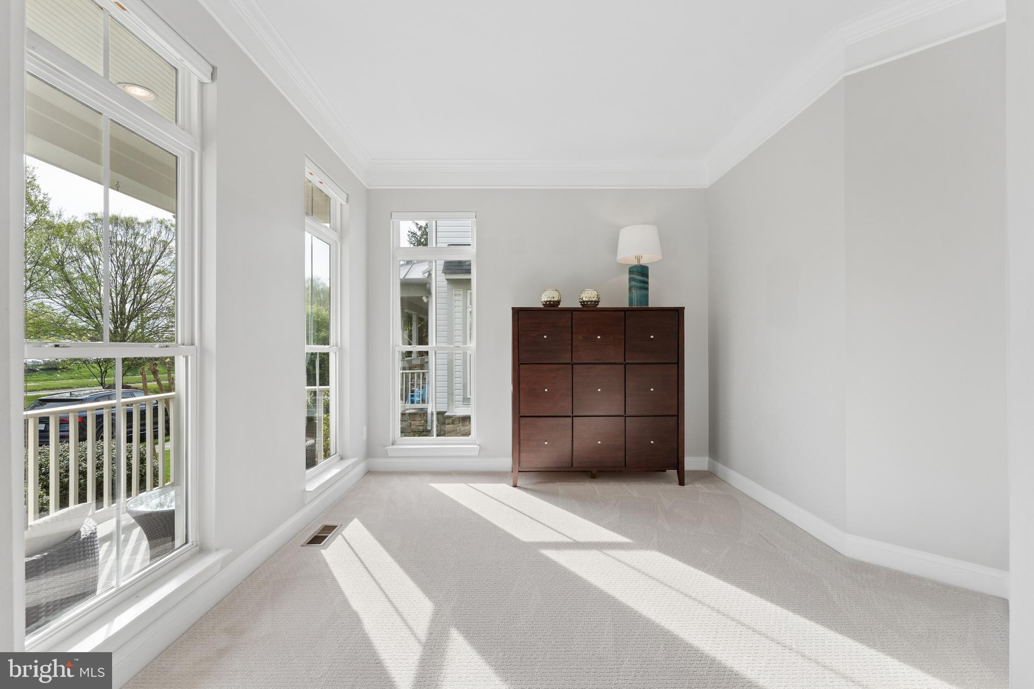 23342 Higbee Lane Brambleton, VA 20148 - Photo 13 of 73 a bedroom with a bed and a window