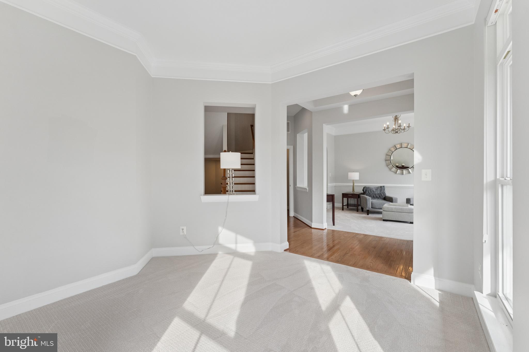 23342 Higbee Lane Brambleton, VA 20148 - Photo 15 of 73 a view of a bedroom with wooden floor