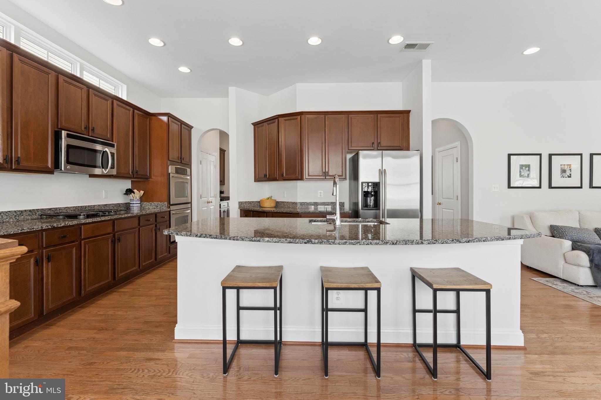 23342 Higbee Lane Brambleton, VA 20148 - Photo 23 of 73 Kitchen with island seating