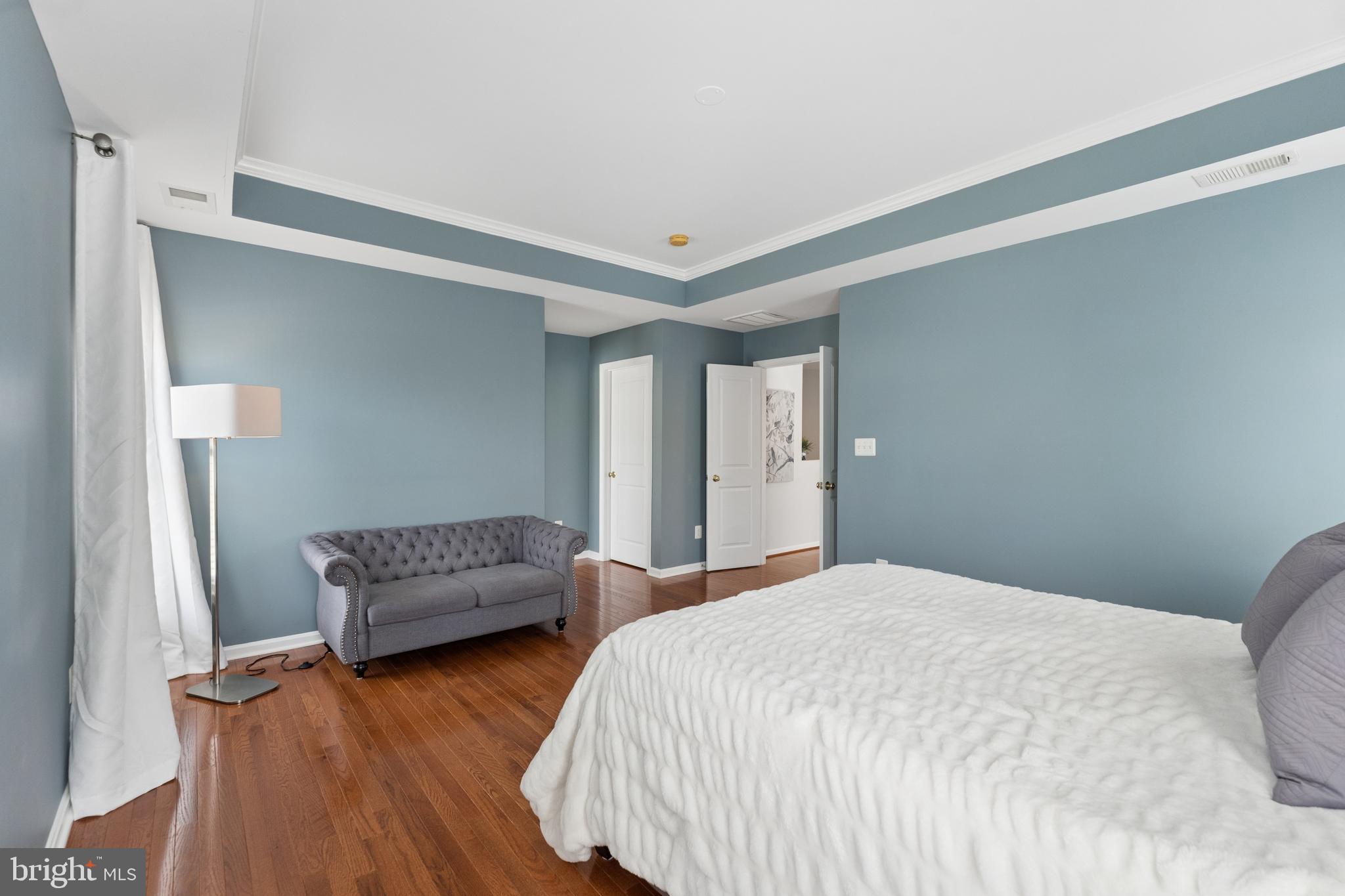 23342 Higbee Lane Brambleton, VA 20148 - Photo 35 of 73 Primary suite with hardwood floors