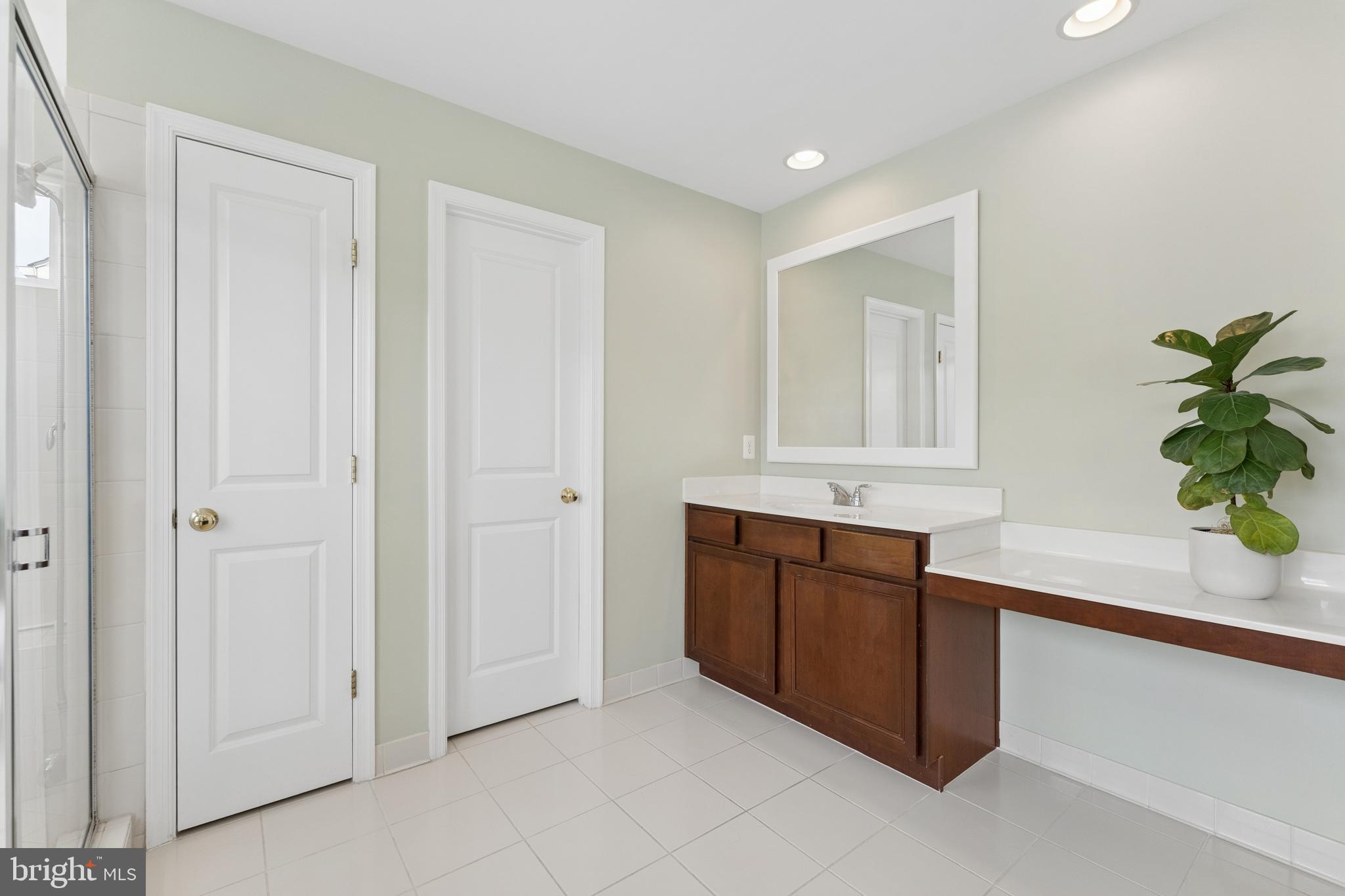 23342 Higbee Lane Brambleton, VA 20148 - Photo 39 of 73 Primary bath w 2 vanities and sep water closet
