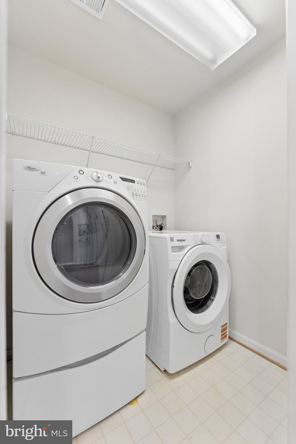 23342 Higbee Lane Brambleton, VA 20148 - Photo 51 of 73 a utility room with dryer and washer