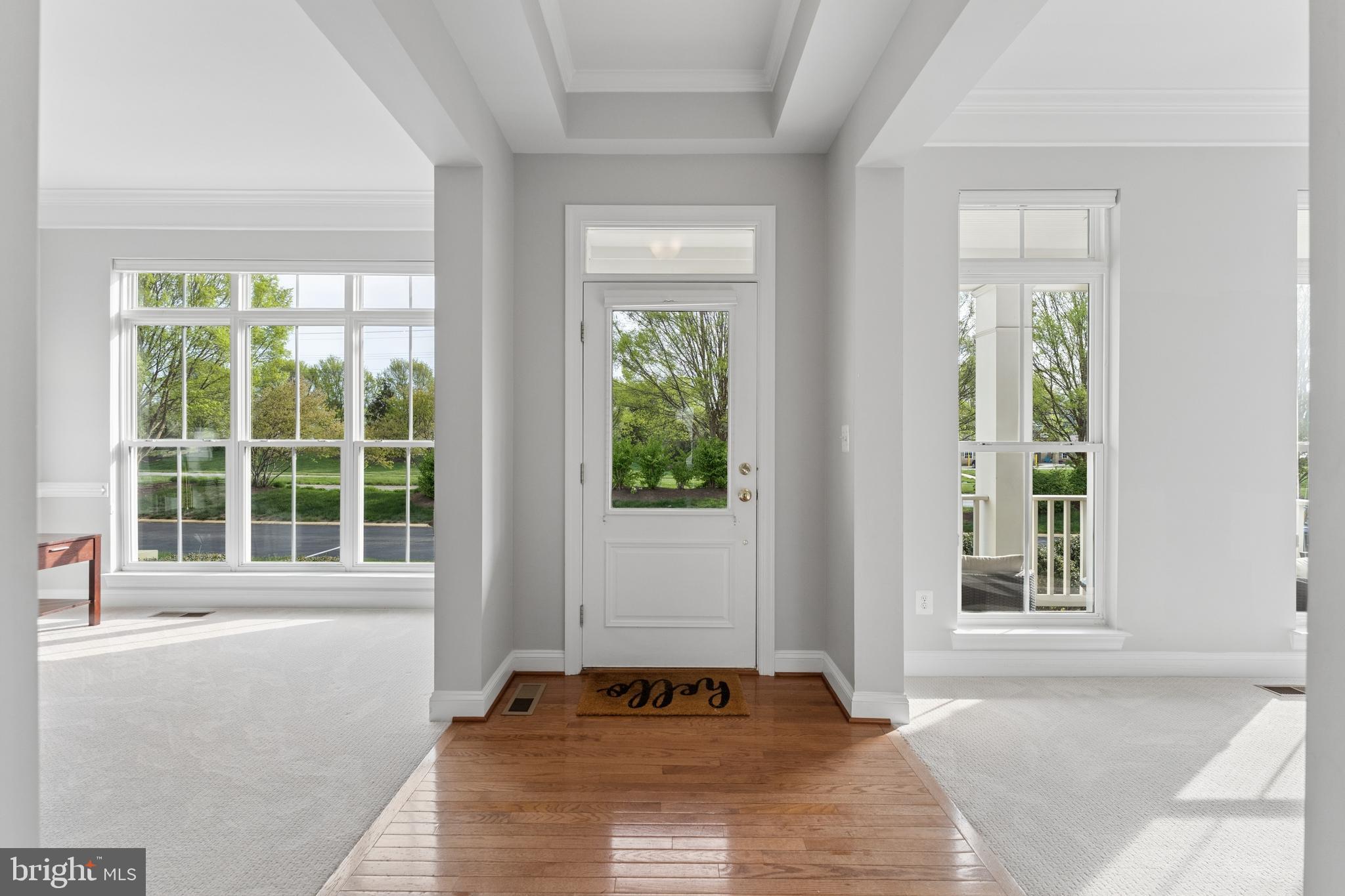 23342 Higbee Lane Brambleton, VA 20148 - Photo 6 of 73 Hardwood entry foyer, center hall