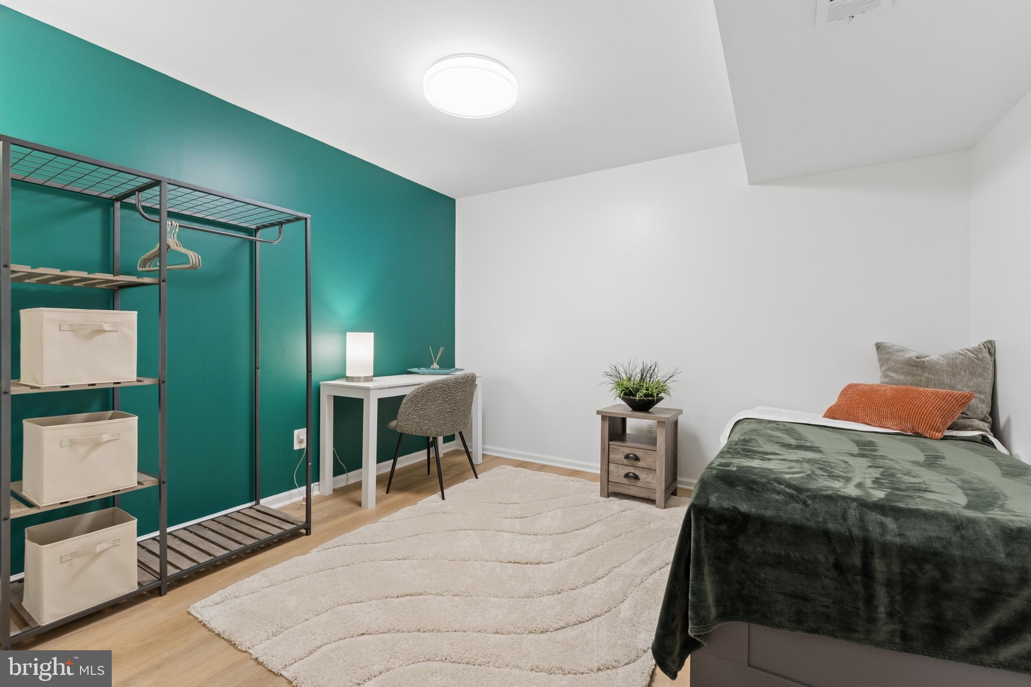 23342 Higbee Lane Brambleton, VA 20148 - Photo 60 of 73 a bedroom with a bed table and window