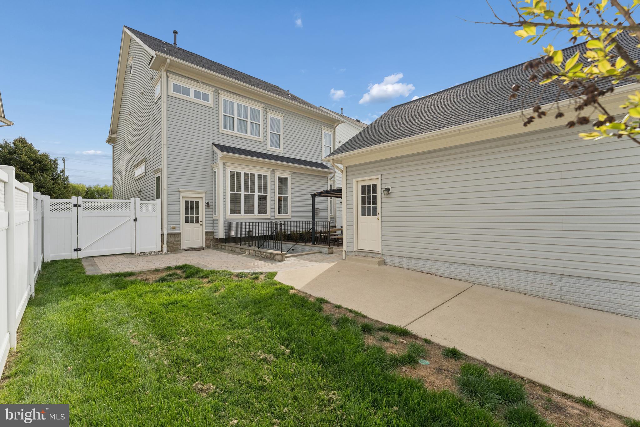 23342 Higbee Lane Brambleton, VA 20148 - Photo 63 of 73 a view of backyard with a garden and plants