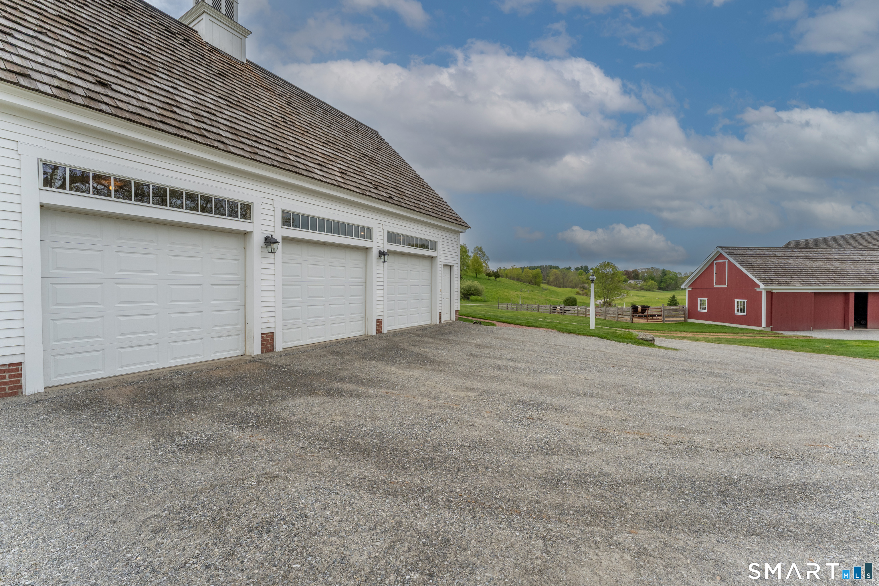 155 Paine Road Woodstock, CT 06281 - Photo 37 of 40 a view of an house with outdoor space and parking