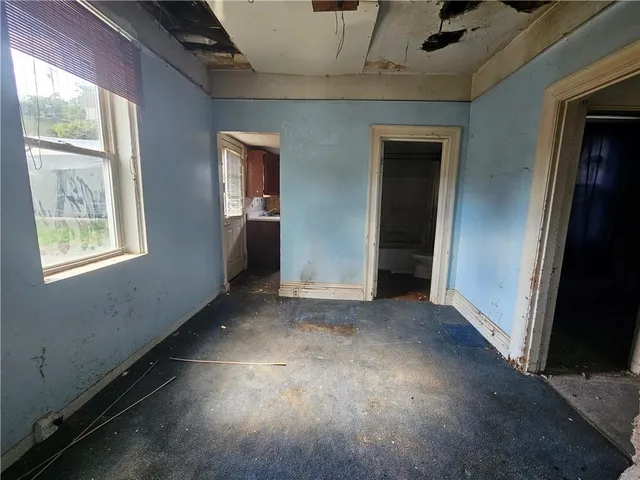 an empty room with windows