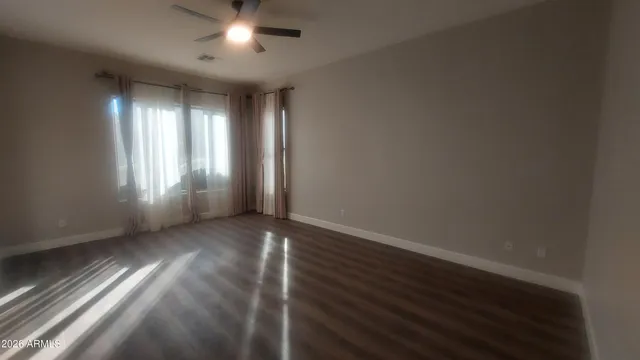 a bathroom with a light fixture and a mirror