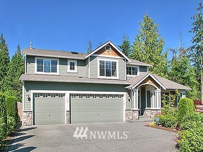 127 167th Place Southeast Bothell, WA 98012 - Photo 1 of 1 a front view of a house with a garage