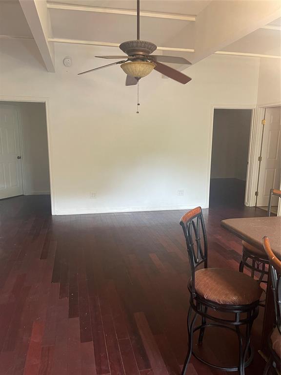 109 Fm 2280, Unit 111C Cleburne, TX 76031 - Photo 2 of 8 a view of a workspace with furniture and wooden floor